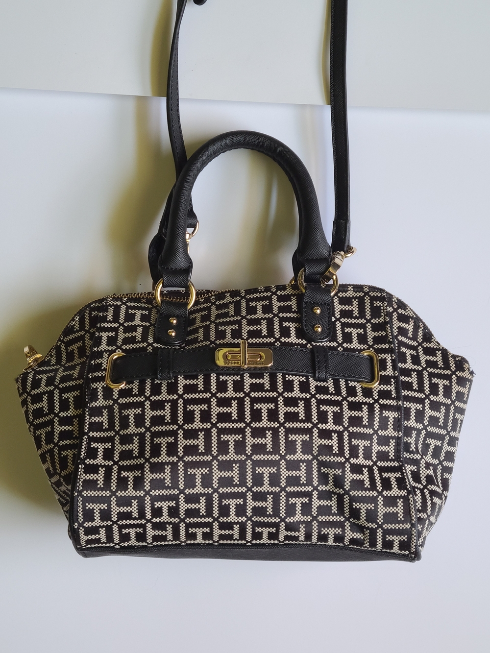 Tommy Hilfiger Black and Cream Patterned Purse with Gold Accents